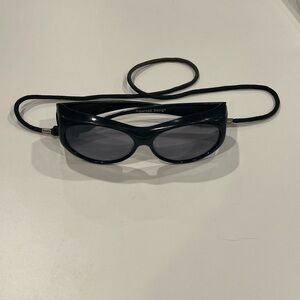 Johnathan Paul Black Sunglasses outdoor with chum Strap